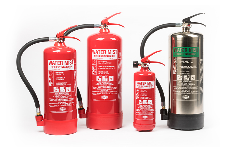 A group of different sized fire extinguishers in red and silver on a white background